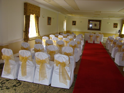 White Chair Cover with Gold Organza Sash